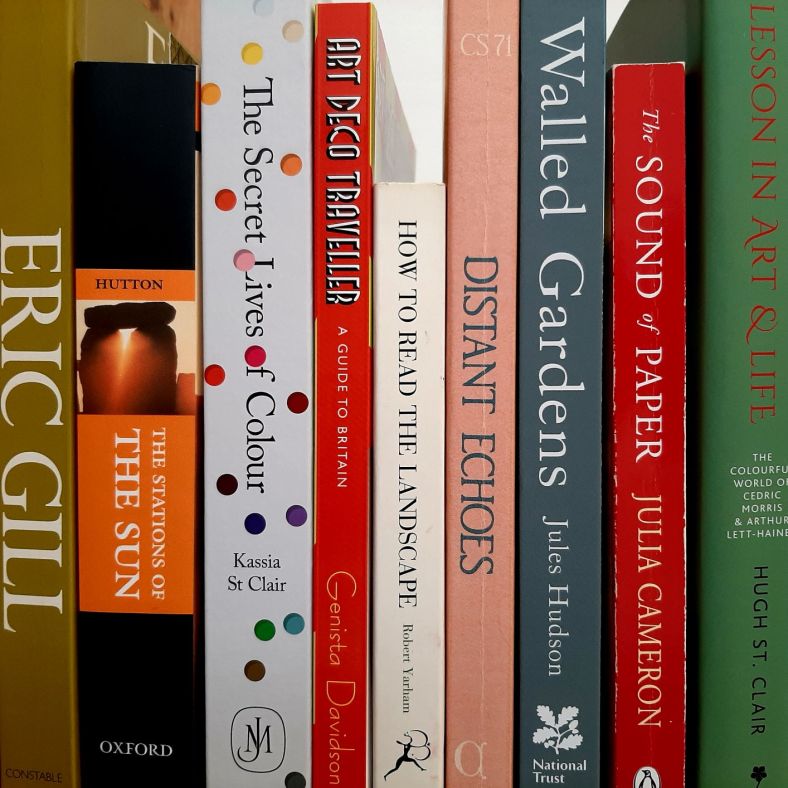 Colour picture of a shelf of books.