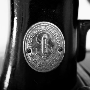 Black and white image of a Singer sewing machine